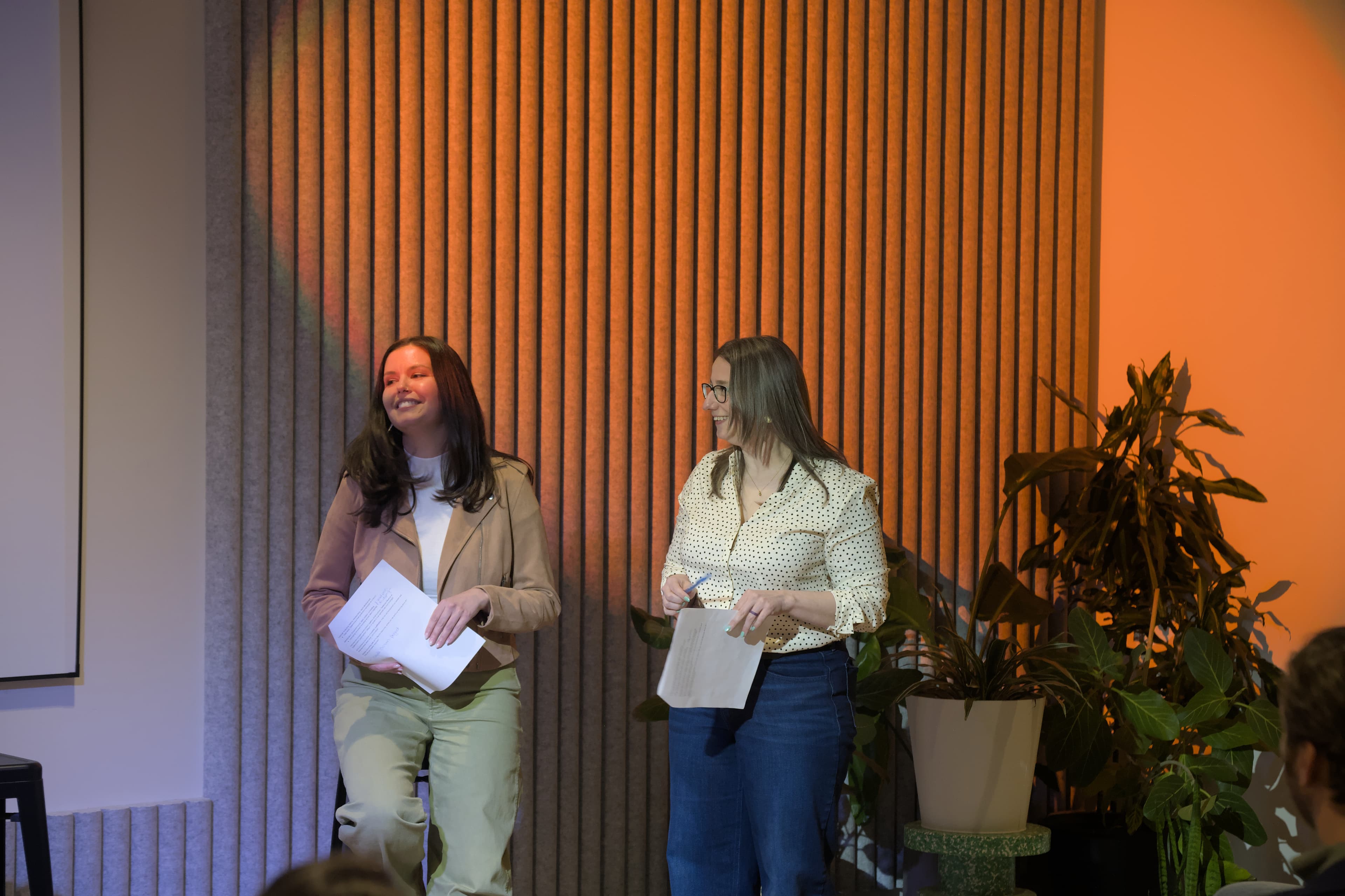 Megan and Nicole speaking together on stage